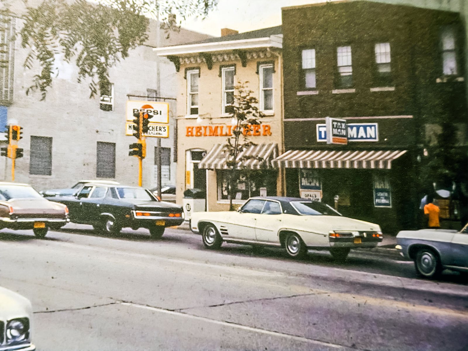 Street view of the Tax Man storefront at 70 East University Avenue, Champaign, Illinois, in 1969