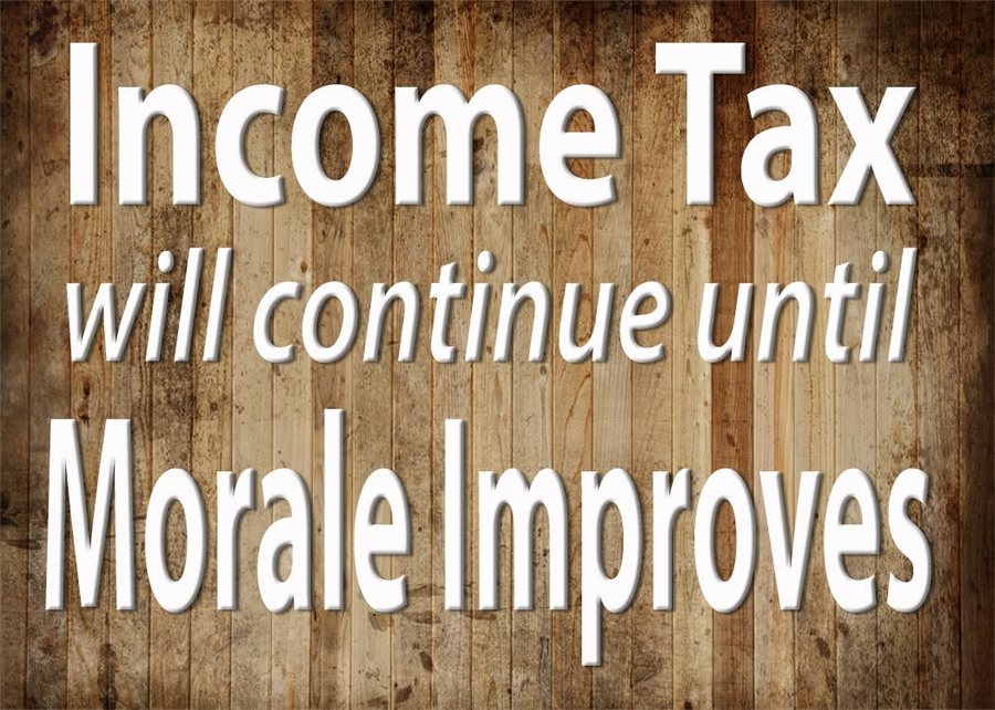 Sign reading: Income tax will continue until morale improves